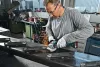 BOSCH 06019J4002 GWS 18V-10 Akumulátorová uhlová brúska 125 mm (bez batérie a nabíjačky)